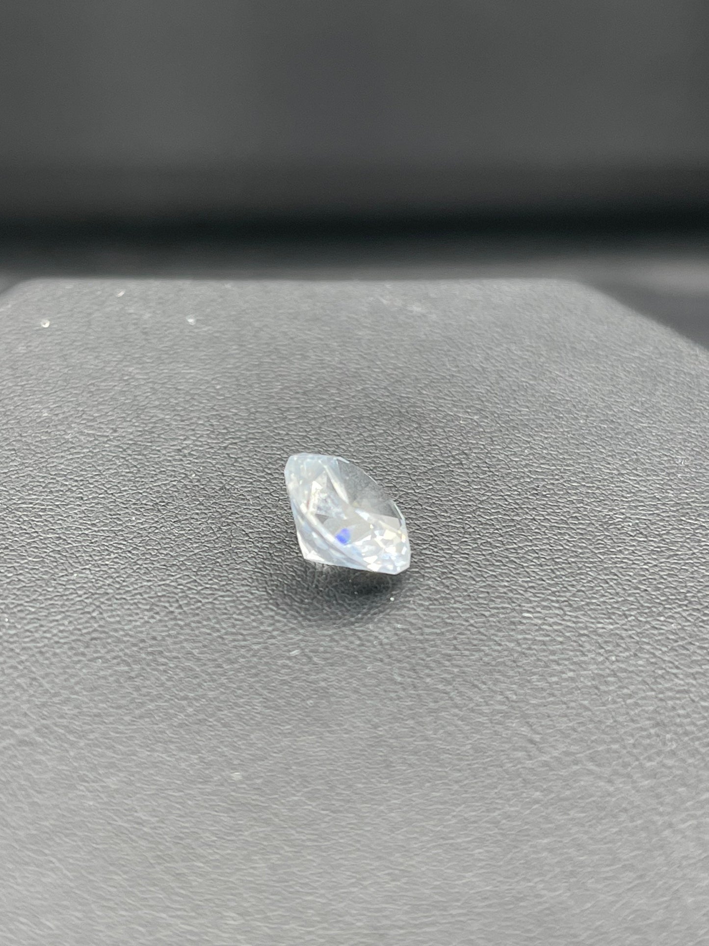 5.66 Natural GIA Certified Round Brilliant White (Very Light Blue) Sapphire