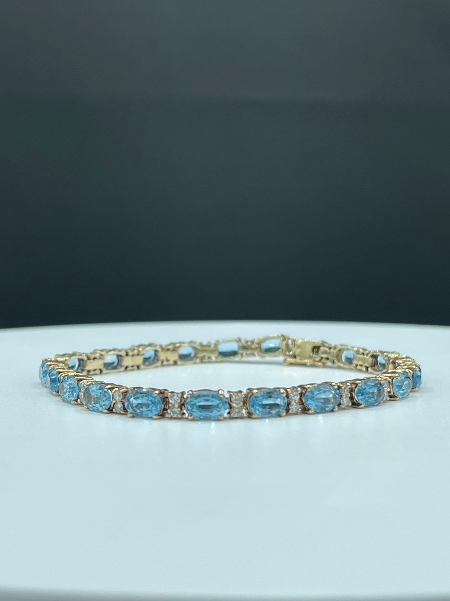 Vintage 13.92 Carat Blue Topaz & Diamond 14k Yellow Gold Tennis Bracelet