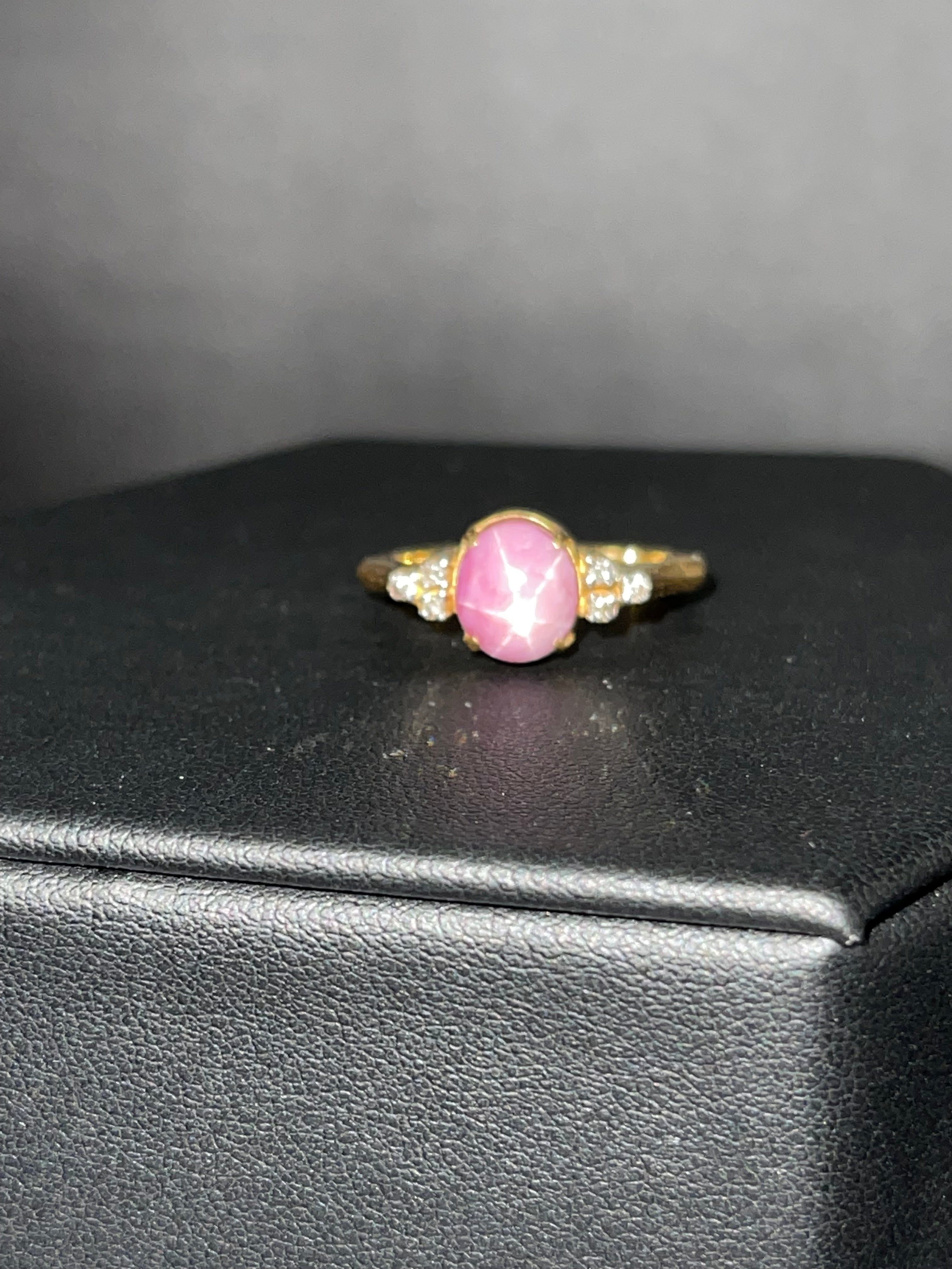 Sold at Auction: 14KT Gold, Pink Star Sapphire, and Diamond Ring