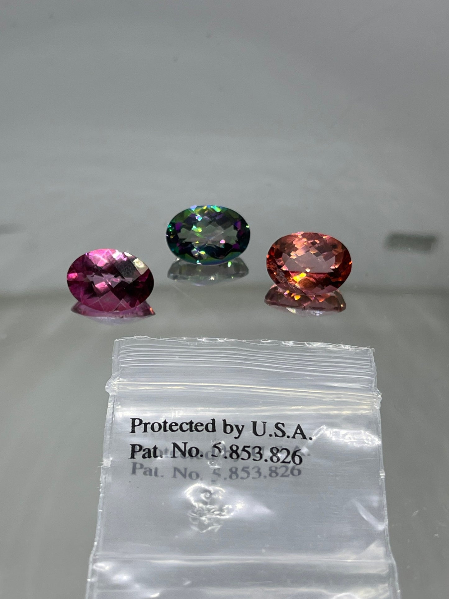 Mystic Fire Topaz Patented authentic Azotic 10x14 MM Oval