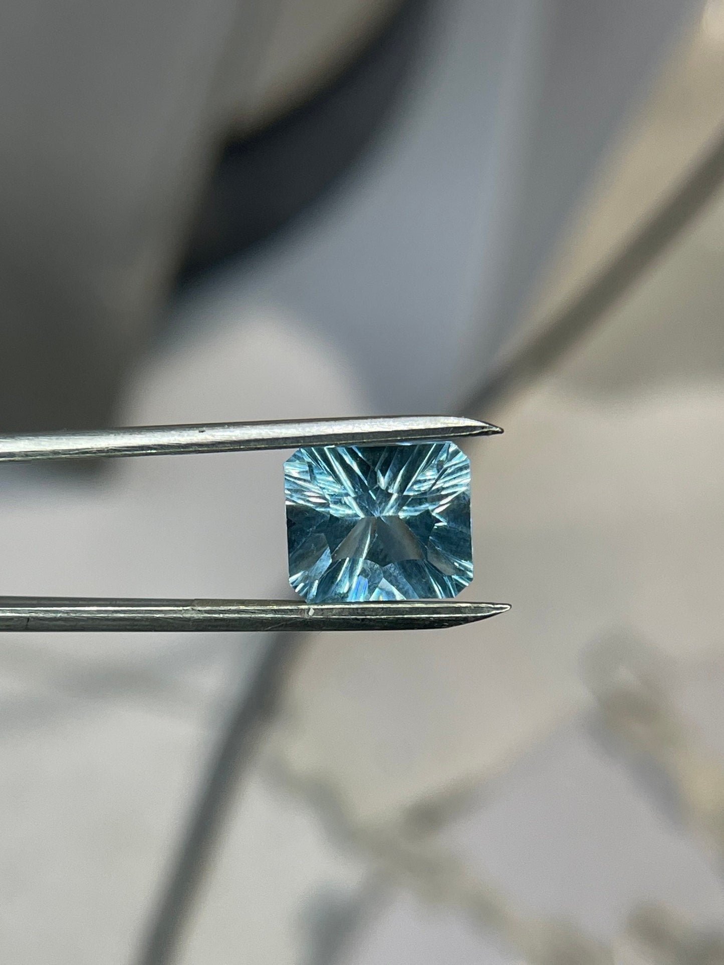 Laser Concave Cut Swiss Blue Topaz 12x10x7 Emerald Cut Loose Gemstone
